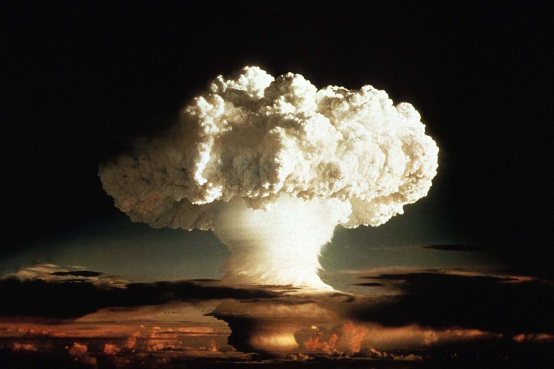 A mushroom cloud rises over Enewetak, an atoll in the Pacific Ocean, during the first test of a hydrogen bomb. The so-called Mike test completely destroyed the tiny island of Elugelab.
