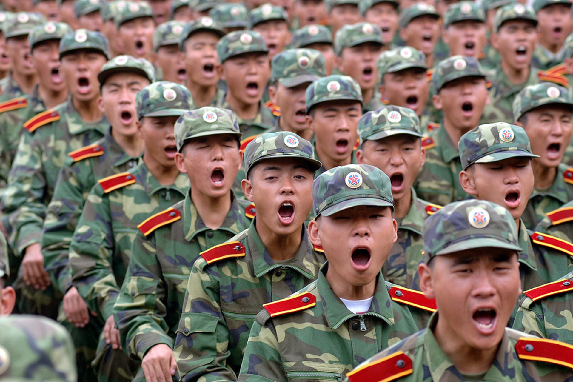 People’s Liberation Army (PLA) recruits chant. 
