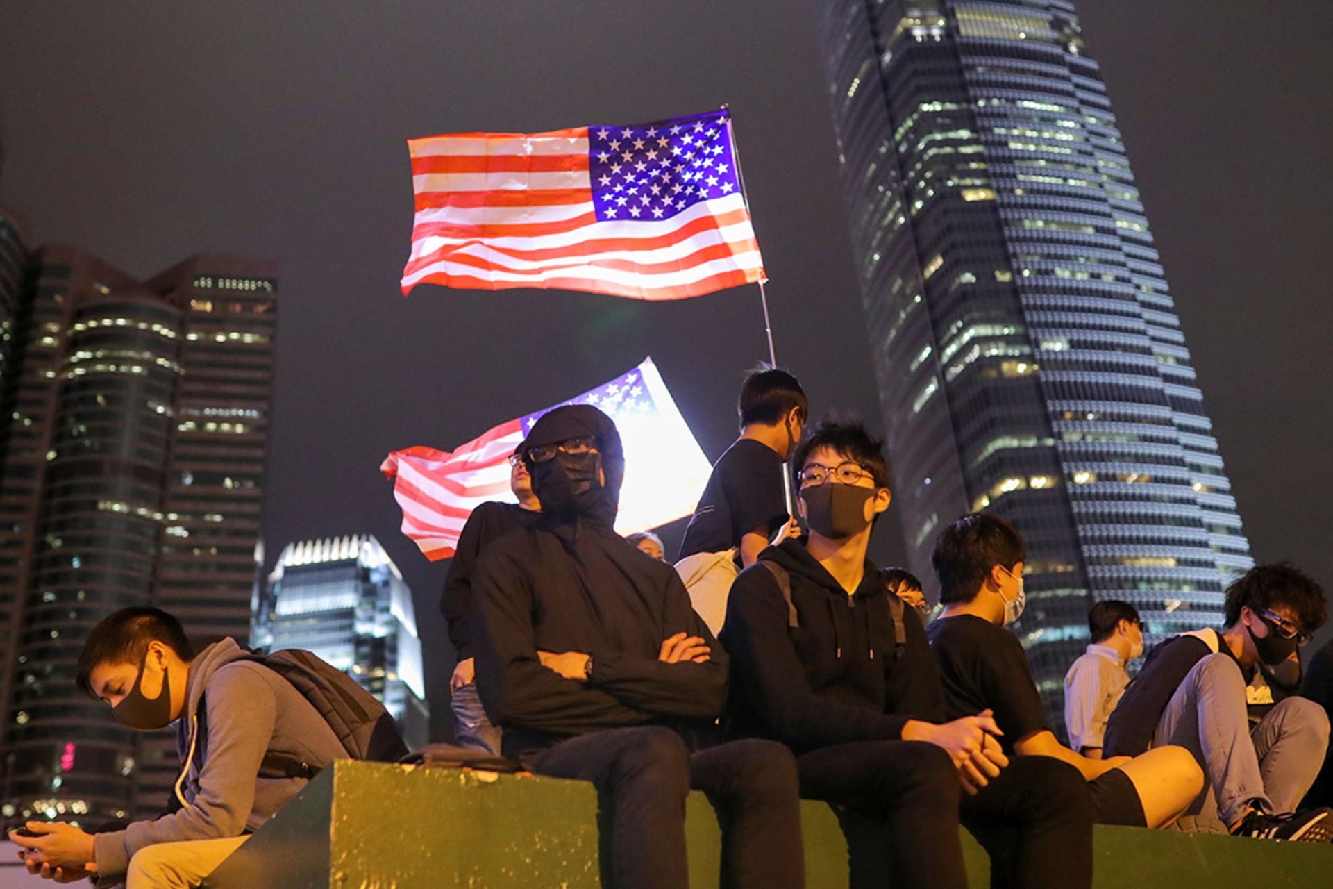 Protesters hold a U.S. flag during a gathering in Hong Kong on November 28, 2019. 
