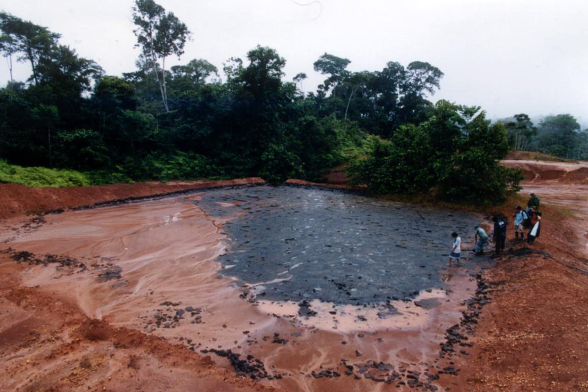 A crude oil waste pit, part of Oxy operations, near Jose Olaya, Peru, 2003.