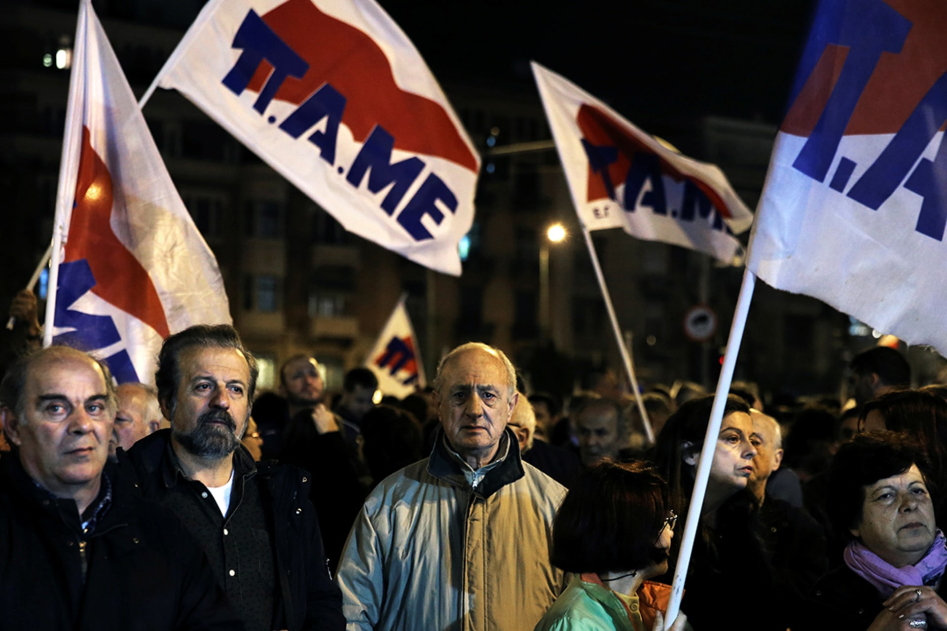 Trade unionists demonstrate in opposition to the EU’s mandated budget cuts and labor reforms in Athens. 
