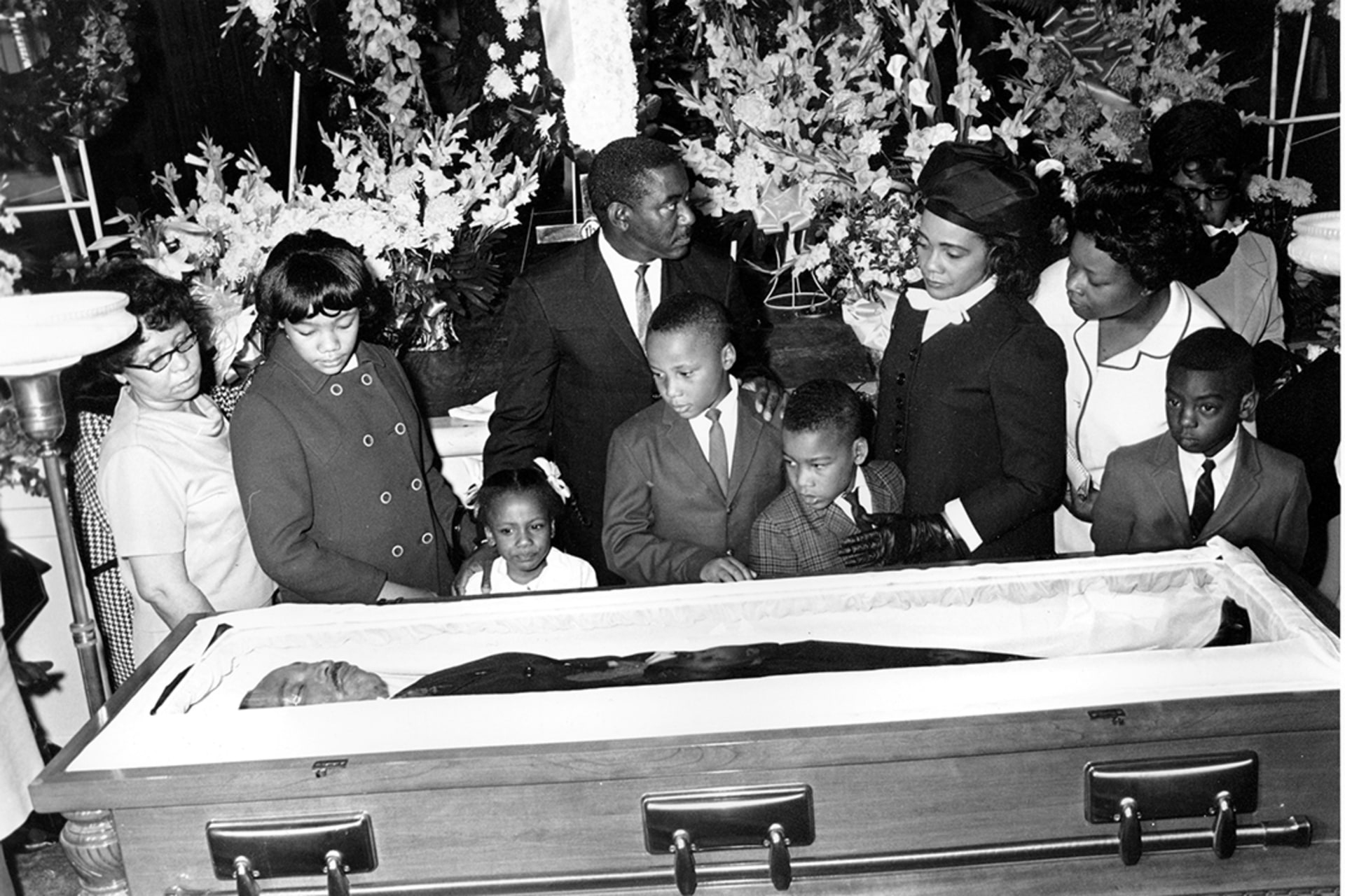 Reverend Martin Luther King Jr.’s body is viewed by his wife, Coretta Scott King, and their four young children at King’s funeral in Atlanta.