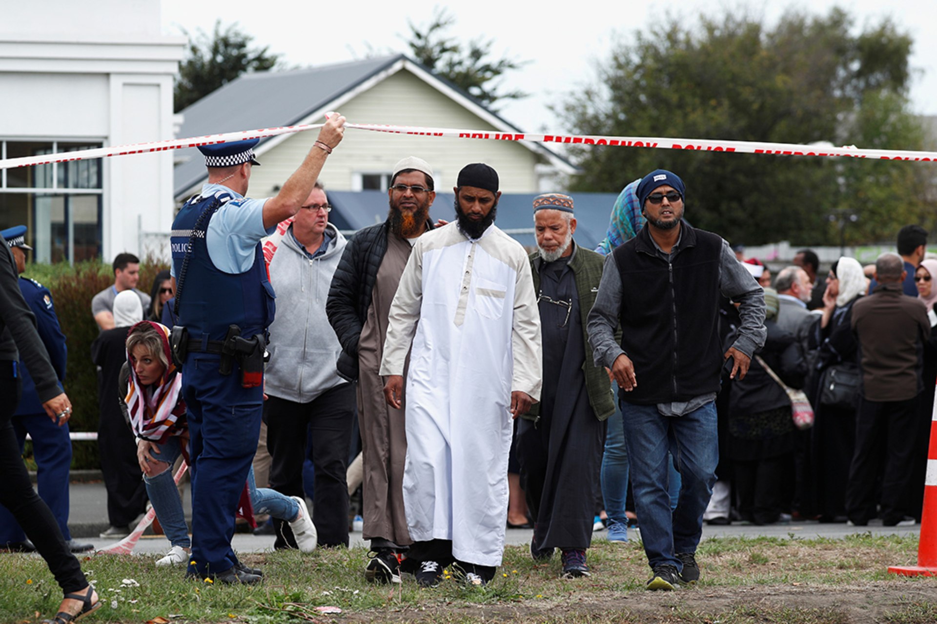 People leave after prayers at the site of Brenton Tarrant’s rampage at the Linwood Islamic Centre in Christchurch, New Zealand.