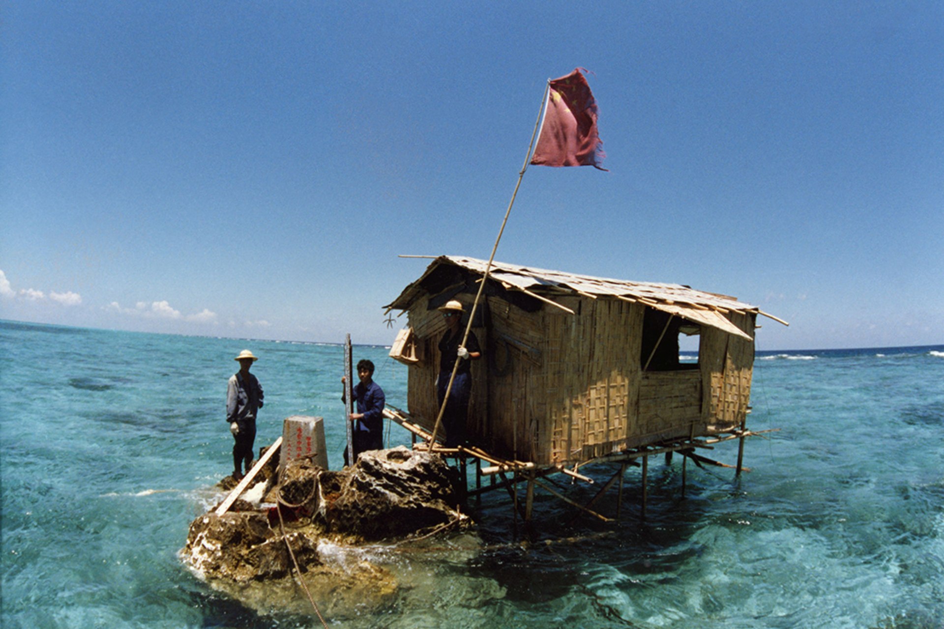 People stand on a Chinese outpost on a reef in the Spratly Islands in 1988. Sovfoto/Universal Images Group/Getty Images