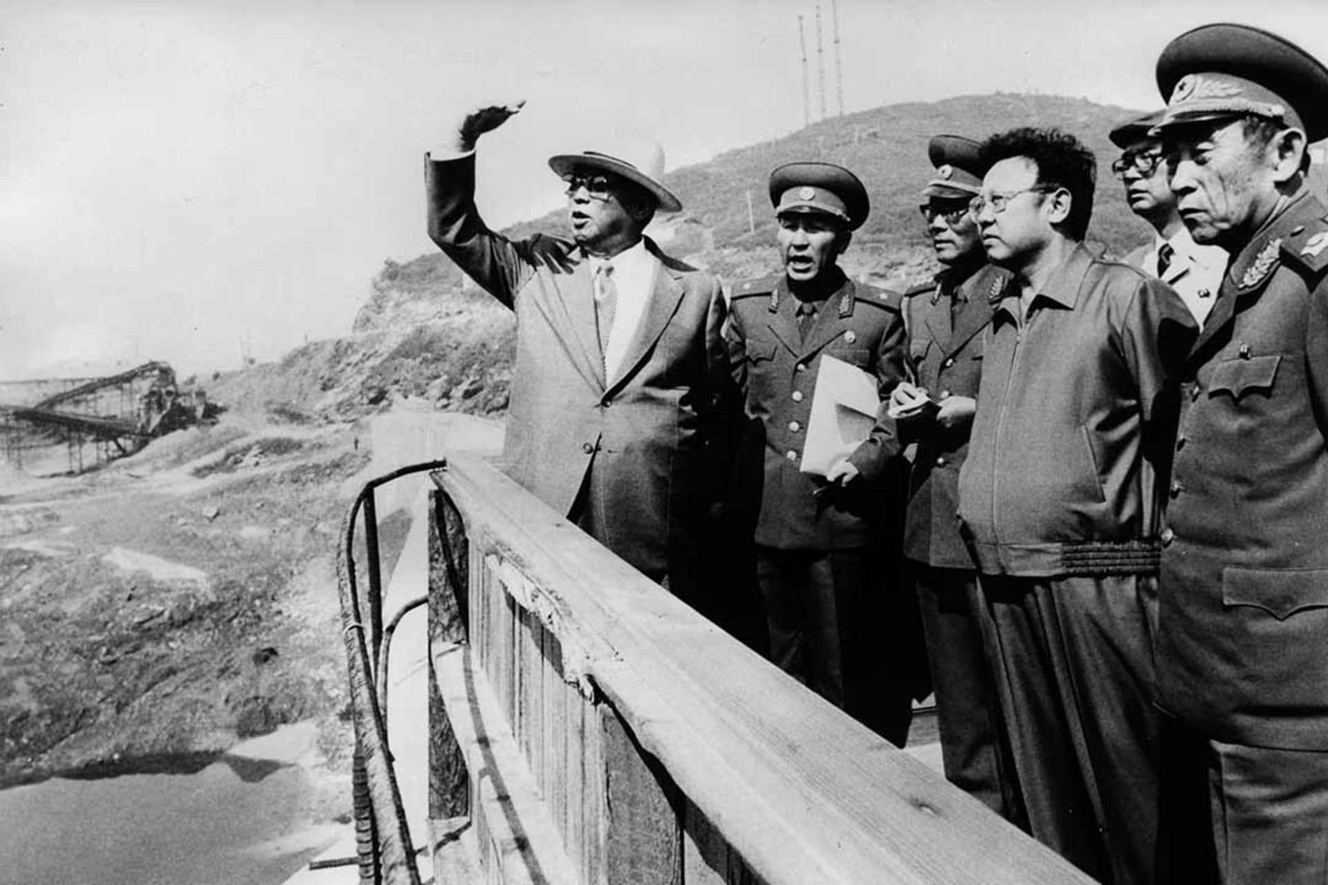 Kim Il-sung and Kim Jong-il oversee the construction of a dam. KCNA/AP Photo