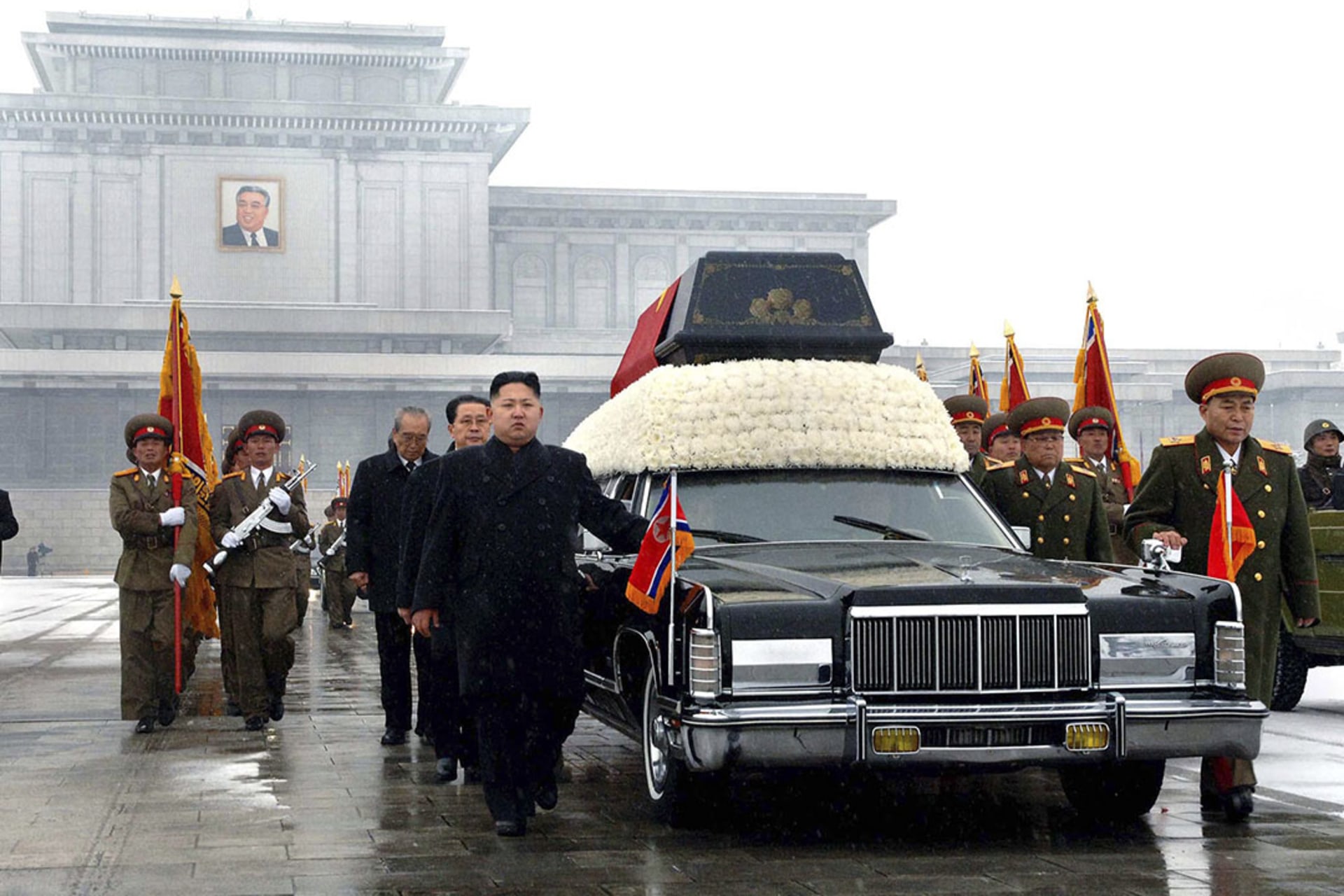 Kim Jong-un and other top North Korean officials accompany the coffin of Kim Jong-il during the late leader’s funeral procession. KCNA/Reuters