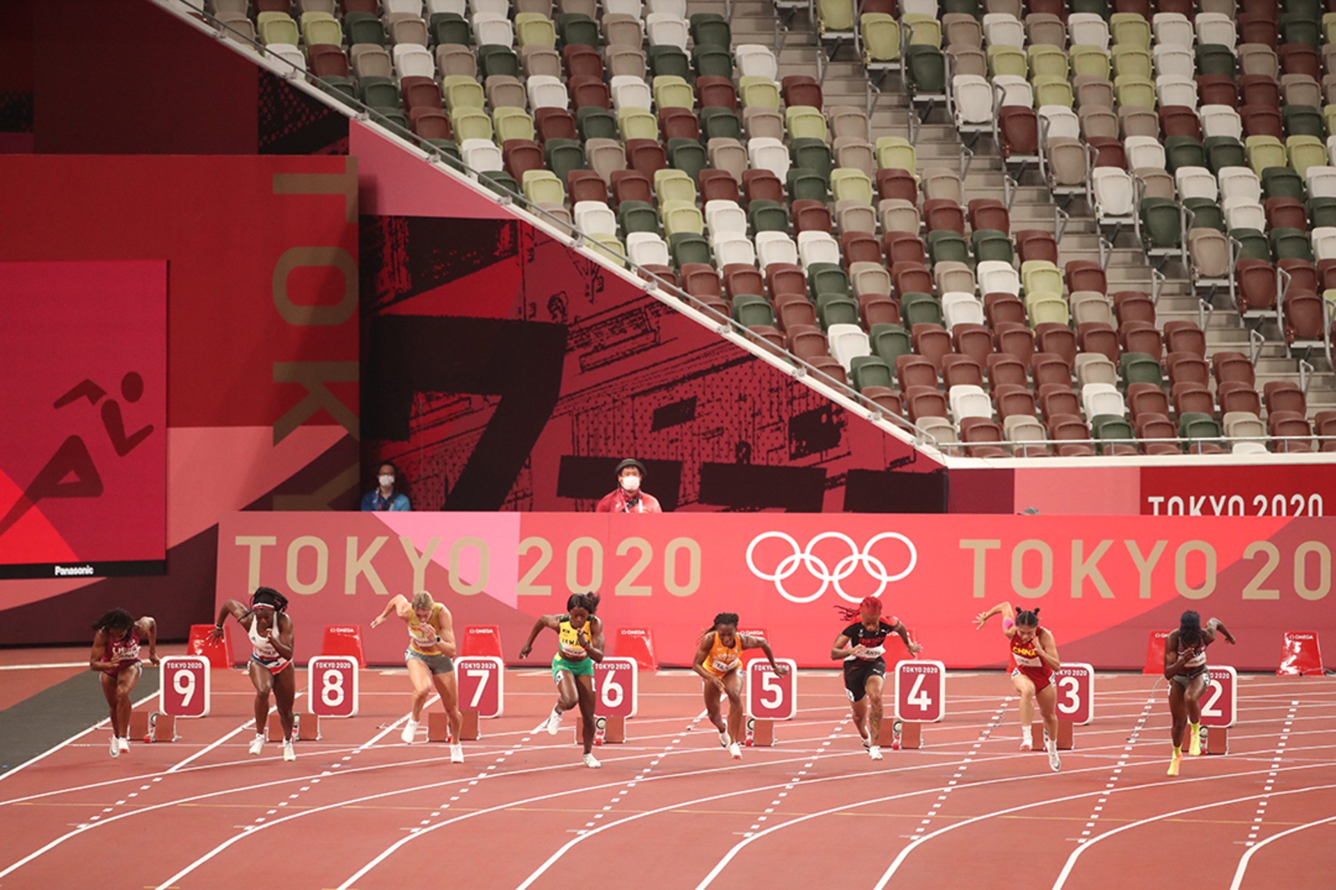 Sprinters race in an empty stadium due to pandemic-related restrictions in Tokyo. Tim Clayton/Corbis/Getty Images
