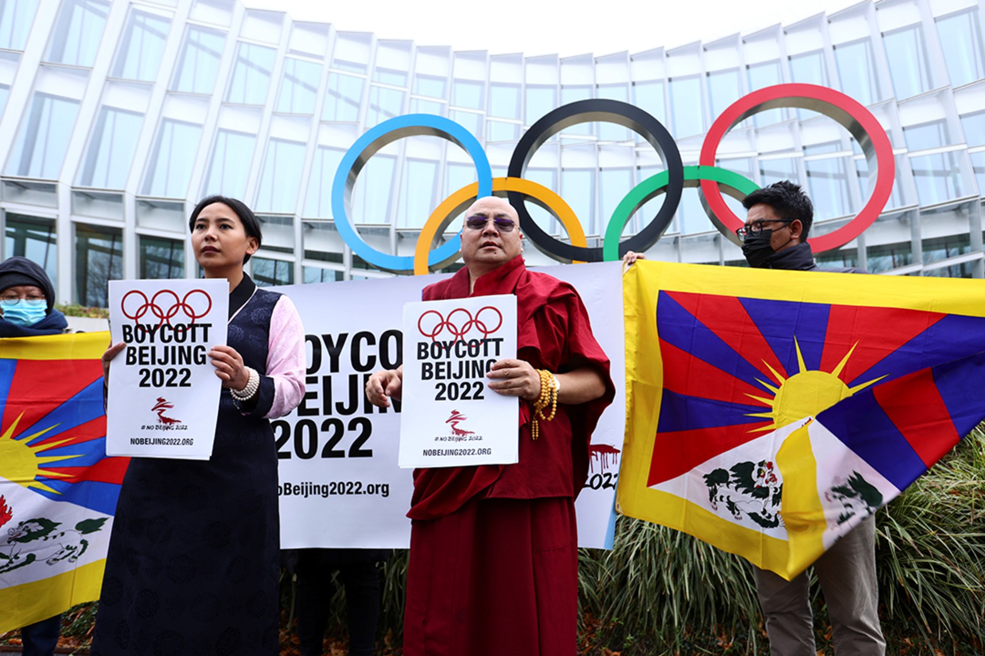Demonstrators display the Tibetan flag outside the IOC headquarters in Switzerland to protest the 2022 games in Beijing. Denis Balibouse/Reuters