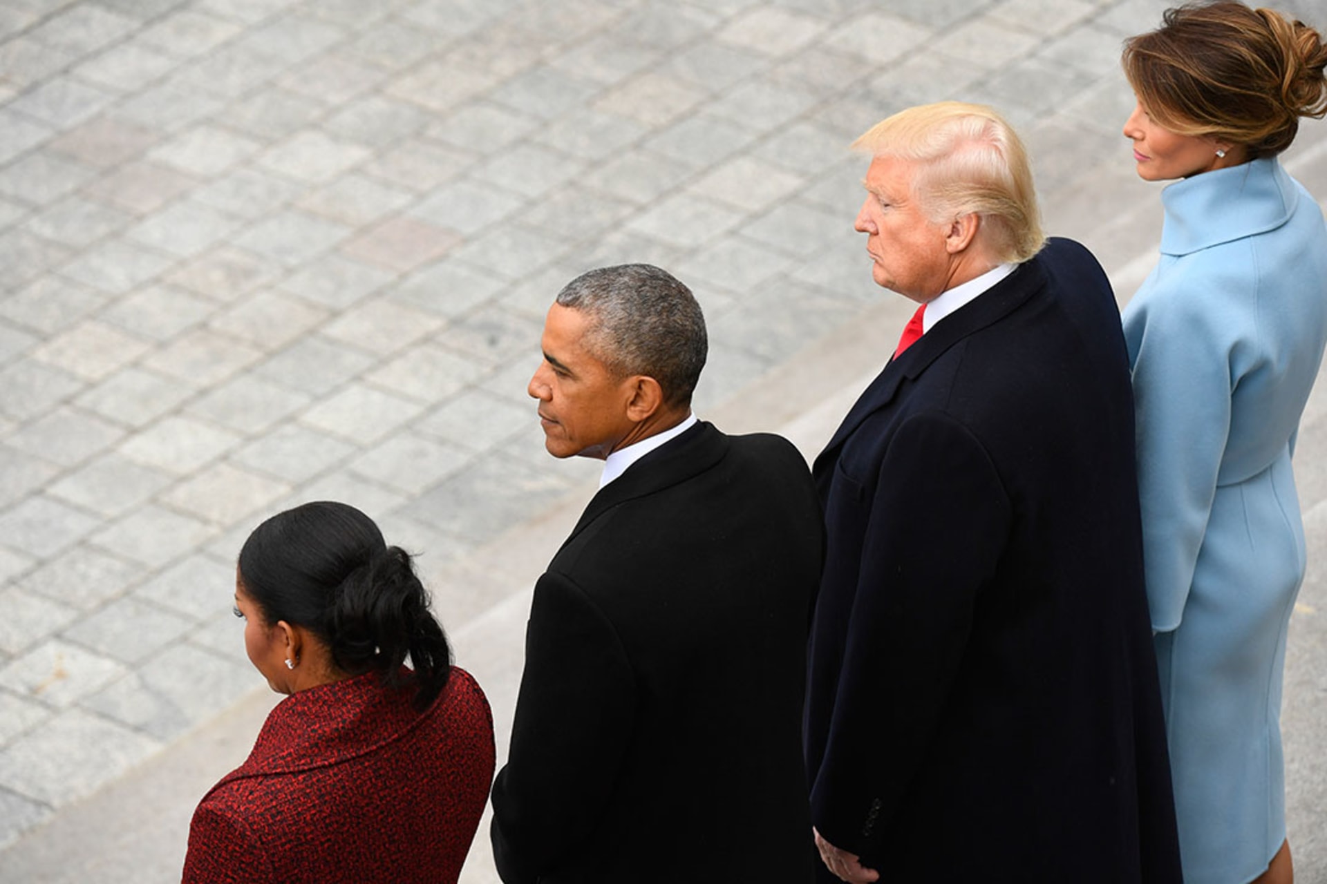 Former President Barack Obama and Michelle Obama stand with President Donald Trump and Melania Trump at the 2017 inauguration. Jack Gruber/Pool/Reuters