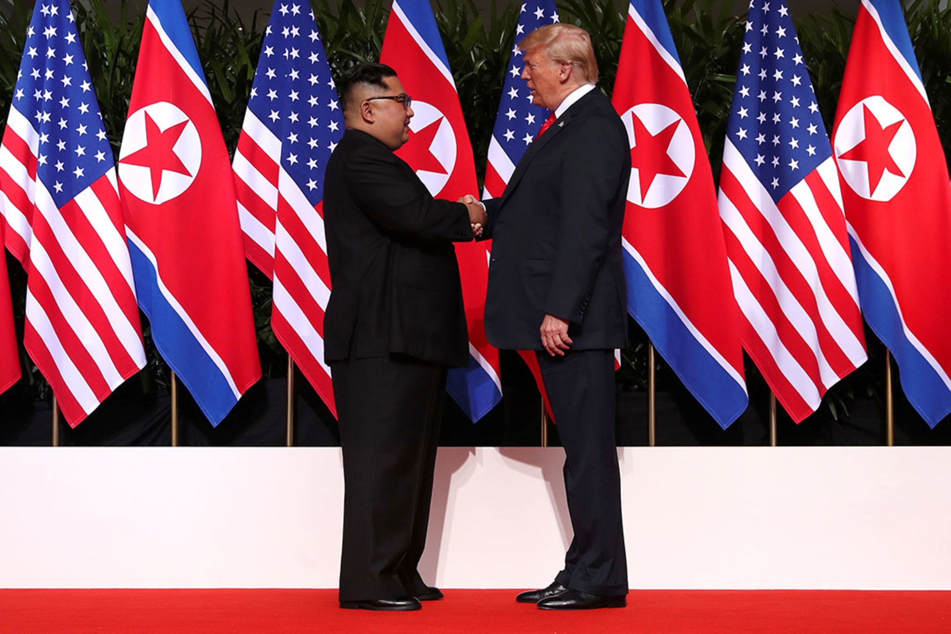 Trump and Kim shake hands during the Singapore summit. Jonathan Ernst/Reuters