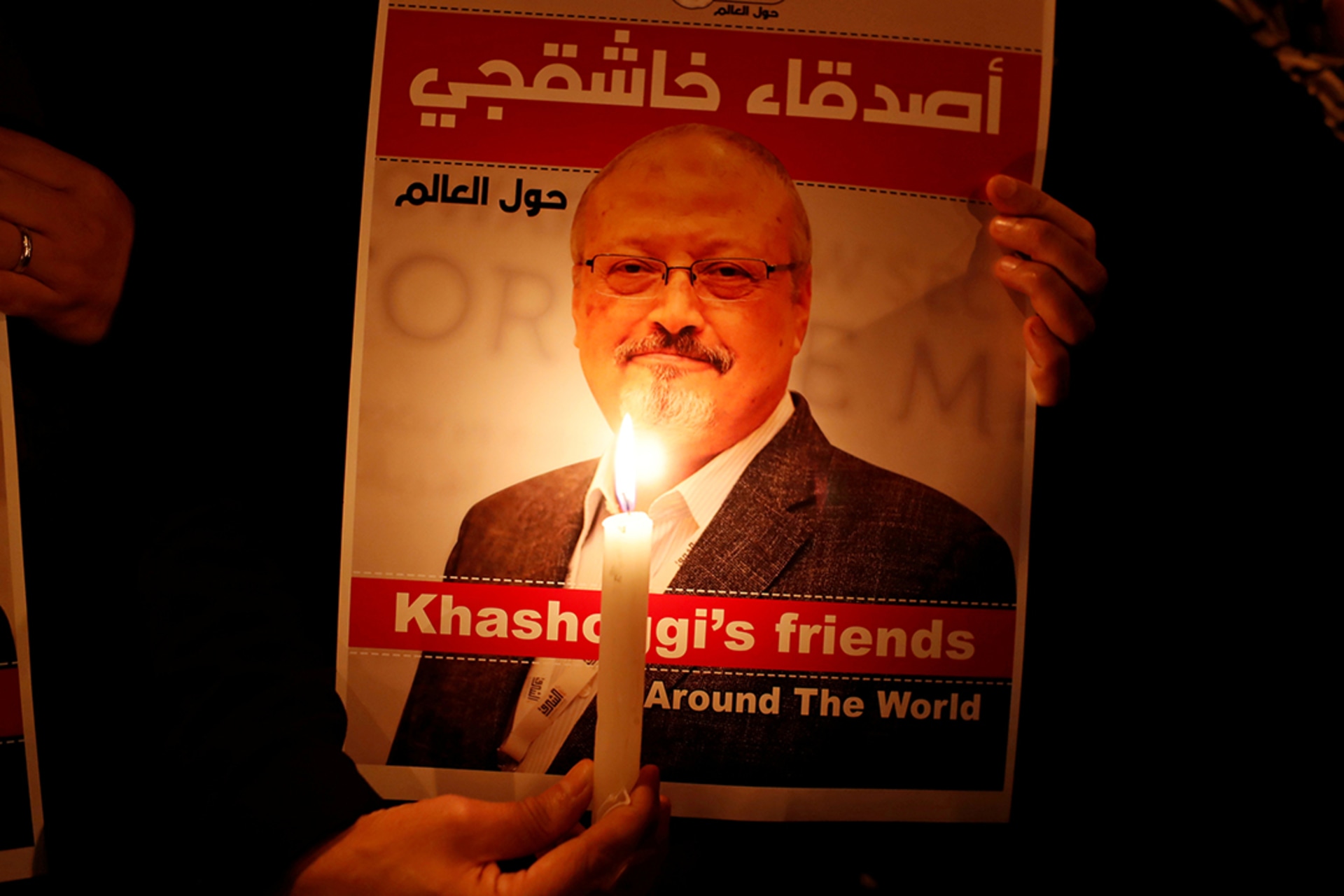 A demonstrator holds a poster of journalist Jamal Khashoggi outside the Saudi consulate in Istanbul. Osman Orsal/Reuters