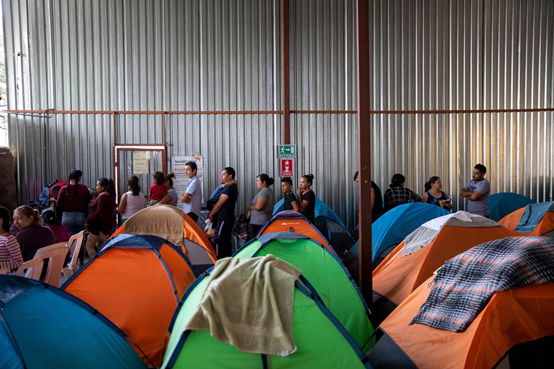 Migrants from Central America wait at a shelter in Tijuana, Mexico, in July 2019. Eduardo Jaramillo Castro/AFP/Getty Images
