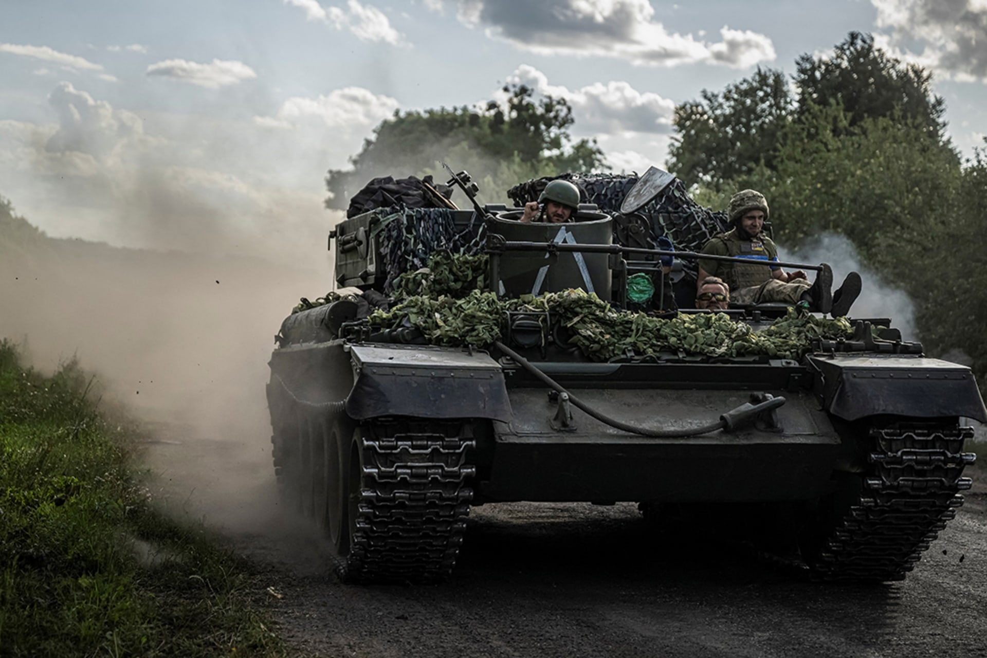 Ukrainian troops ride in a military vehicle in northeast Ukraine’s Sumy Oblast, near the border with Russia. 
