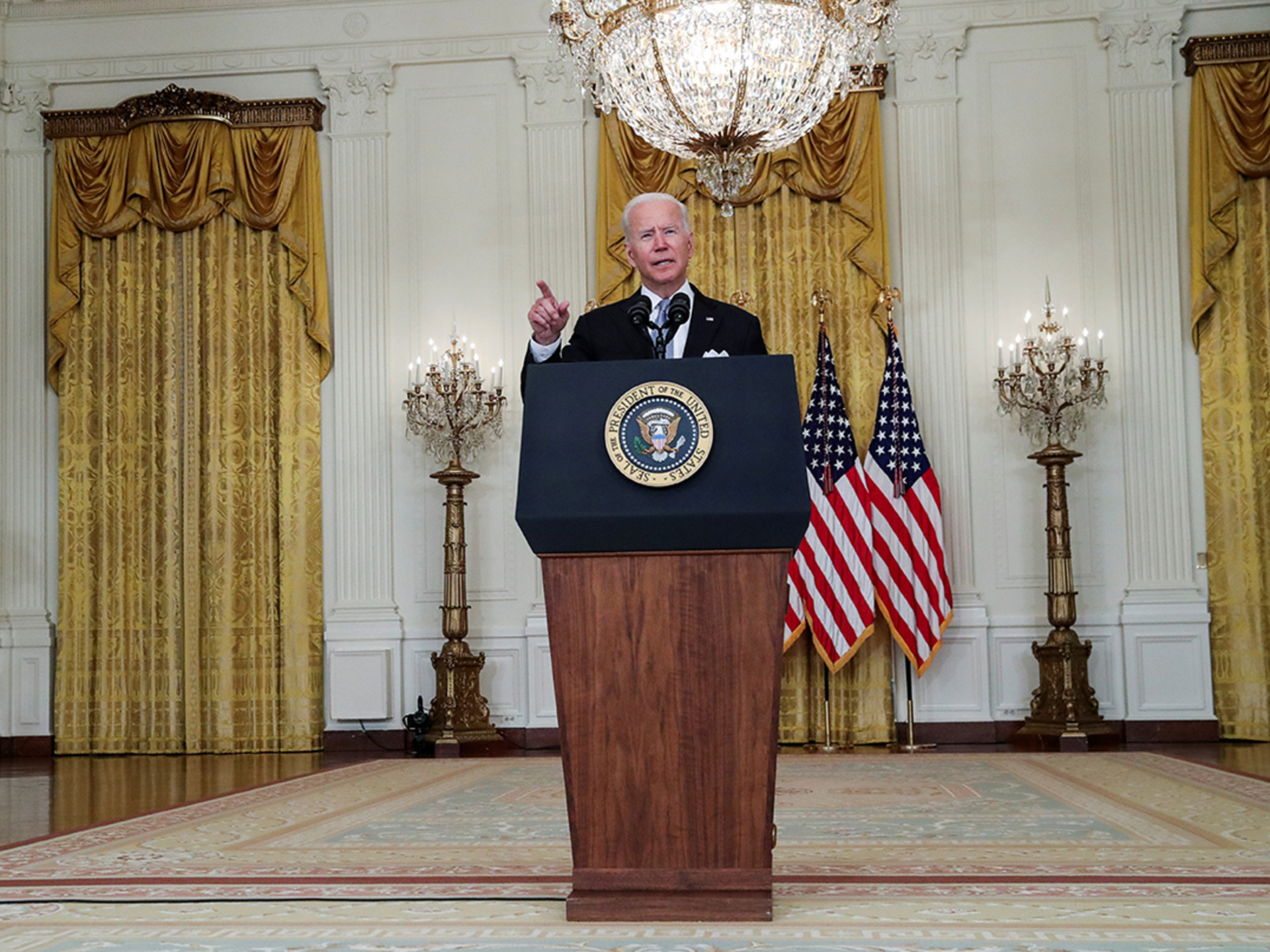 President Joe Biden defends ending U.S. military involvement in Afghanistan during remarks at the White House. 

