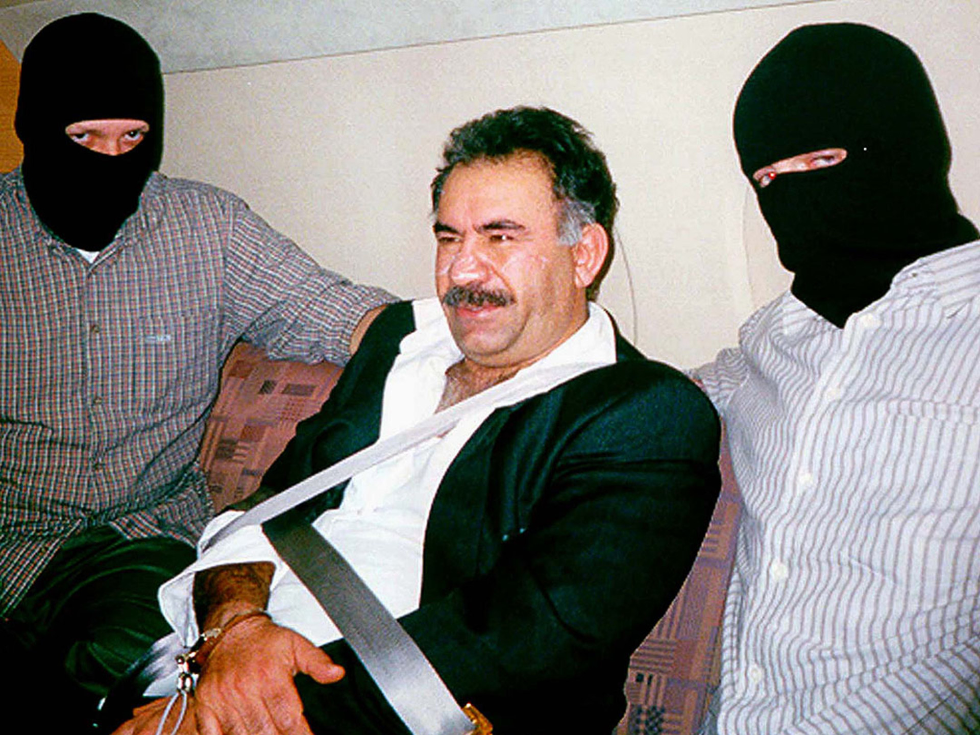 Turkish special forces flank a bound and handcuffed Abdullah Ocalan, who was captured in Kenya. Ocalan was flown to Turkey, where he was convicted of treason.