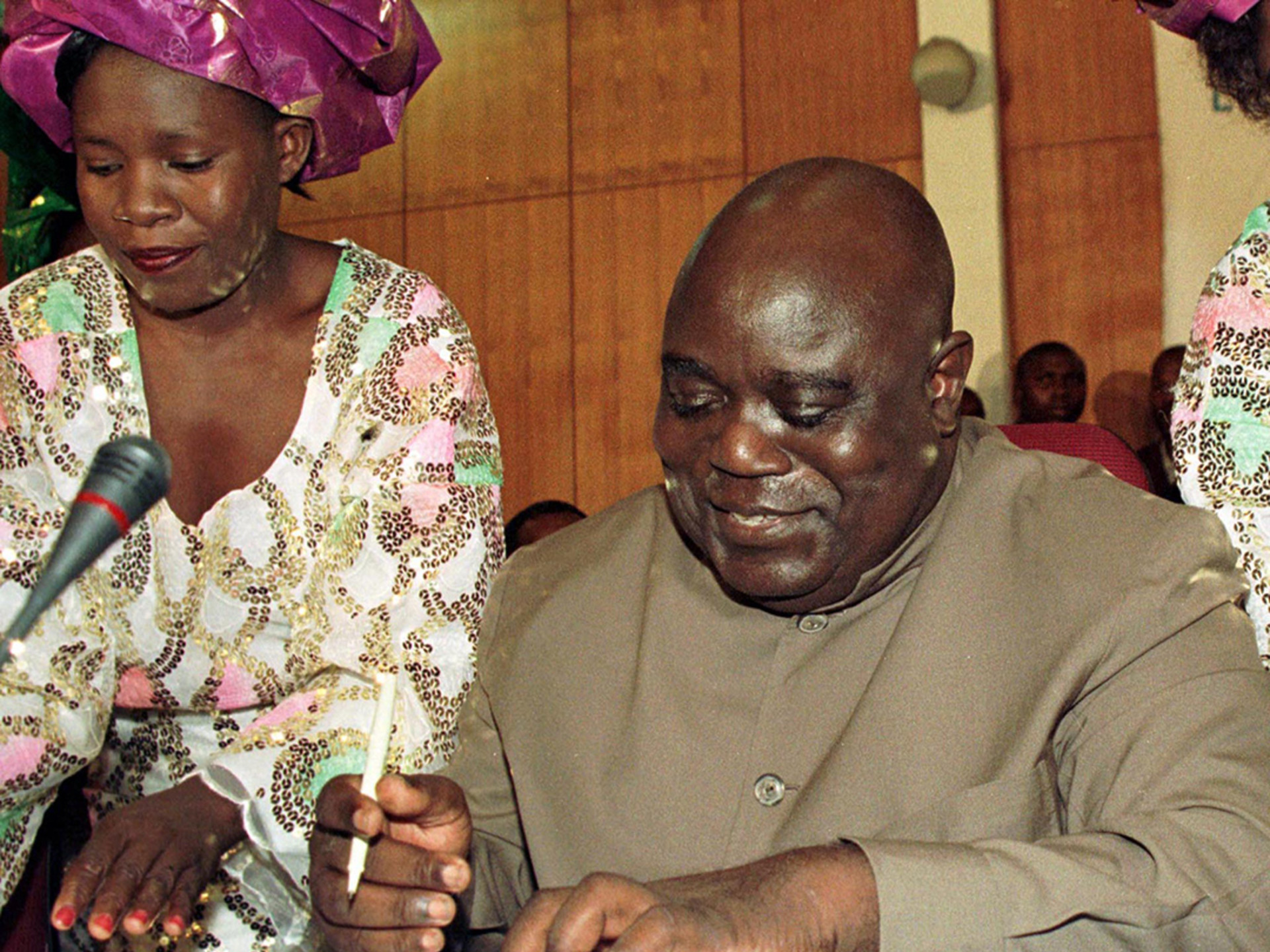 Kabila signs cease-fire documents in Lusaka, Zambia, on July 10, 1999. Howard Burditt/Reuters