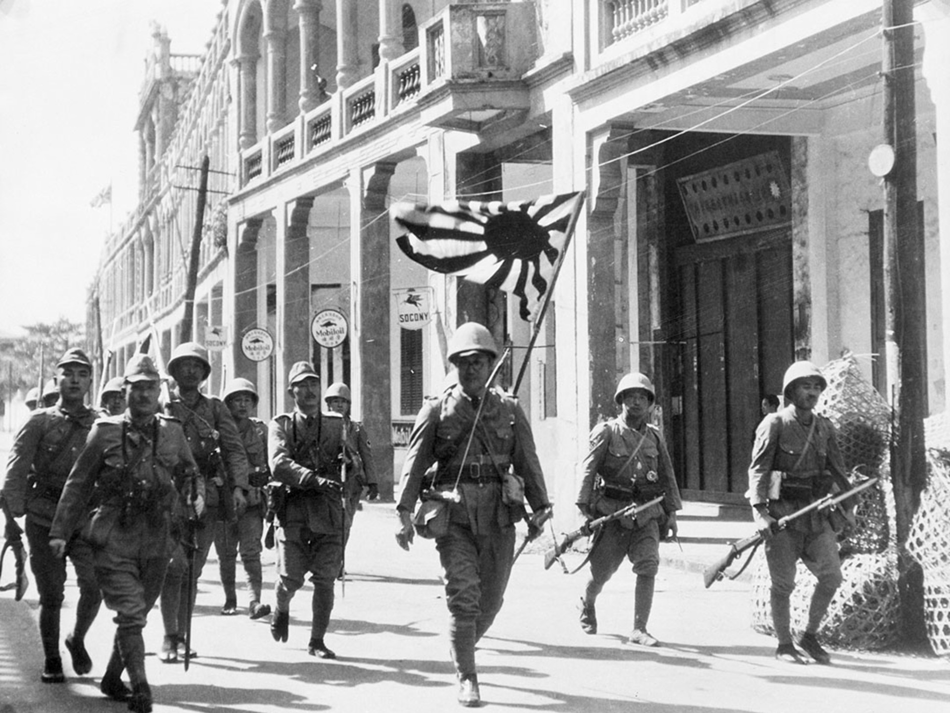 Japanese troops marching through Hainan Island in 1937. Bettmann/Corbis