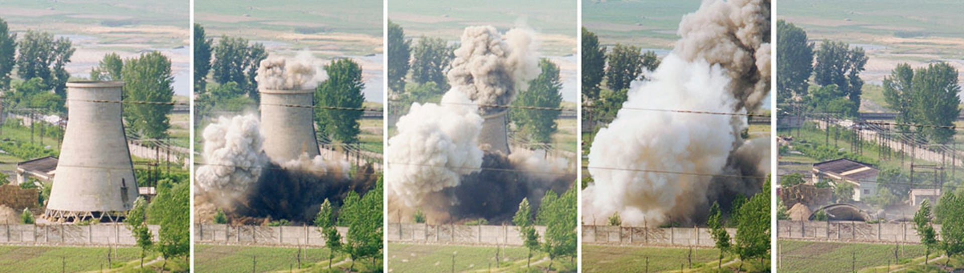 A cooling tower at a North Korean plutonium-producing reactor is demolished. Kyodo/Reuters